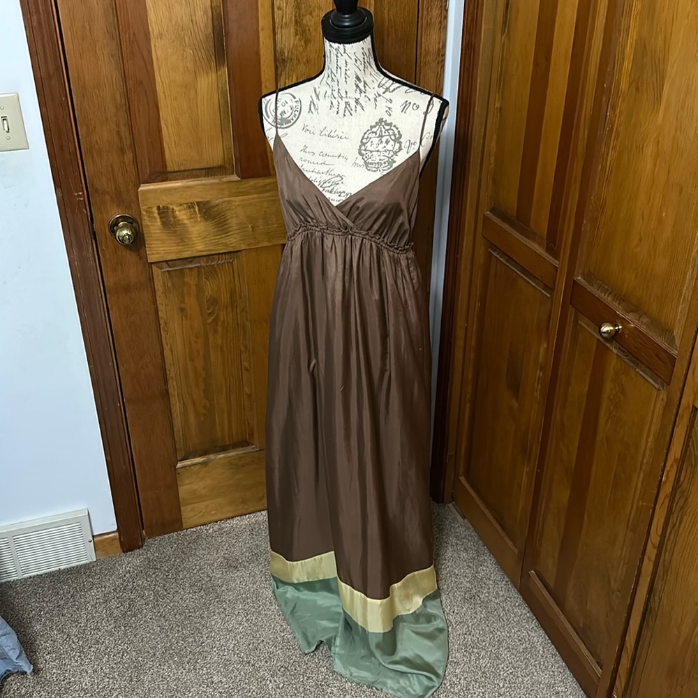 Sun Dress: New With Tags 100% Silk. Lining 100% polyester.